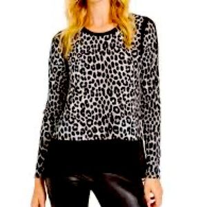 Michael Kors animal print/sheer bottom top. XS. Excellent condition.